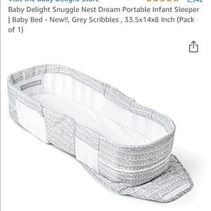 Baby delight snuggle nest